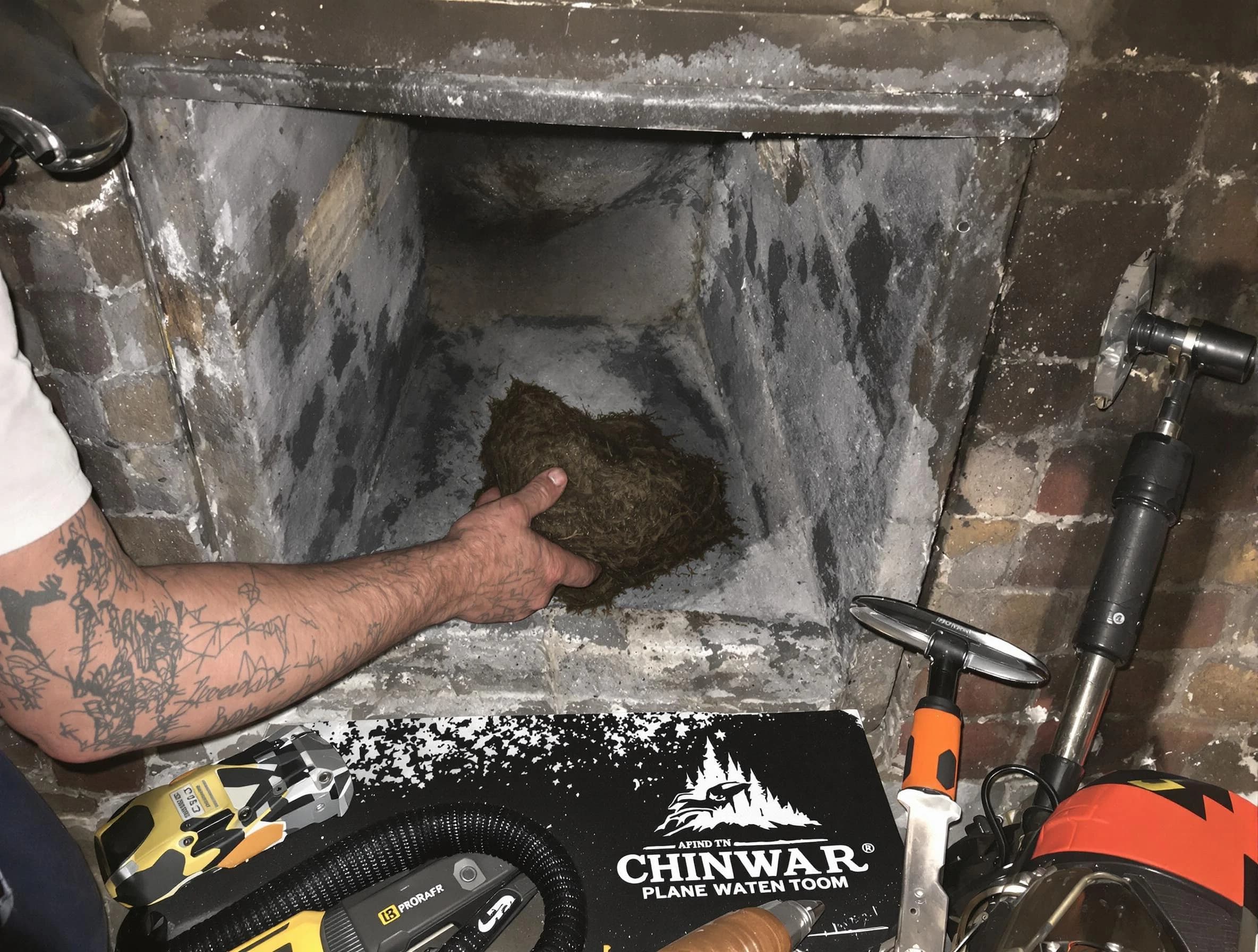Kingfisher Chimney Sweep safely removing debris and screening chimney in Kingfisher, OK